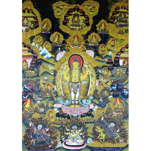 A Bhutanese Thangka, 19th century, painted with various Buddhistic figures surrounding a meditational multi-armed deity, painted on cloth, 110 by 70cm, in modern gilt frame, 121 by 81cm.