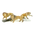 A group of Beswick animal figurines, comprising a Beswick Lion - standing, model 2554B, golden brown... 