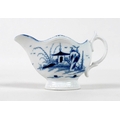 A late 18th century Caughley porcelain miniature milk jug, decorated in underglaze blue with a 'Rock... 