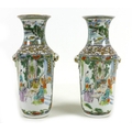 A pair of Chinese porcelain vases, late 19th century, of tapering cylindrical form with narrowed nec... 