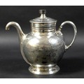 A late Victorian silver plated Royle's Patent self pouring teapot, of ovoid form with engraved flora... 