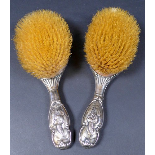 15 - A collection of Edwardian silver dressing table items,  comprising two hair brushes, two clothes bru... 