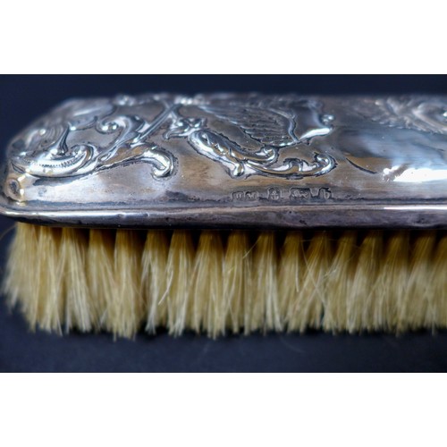 15 - A collection of Edwardian silver dressing table items,  comprising two hair brushes, two clothes bru... 