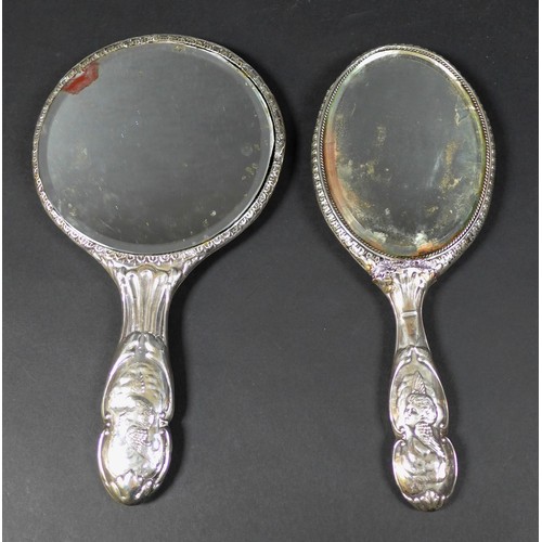 15 - A collection of Edwardian silver dressing table items,  comprising two hair brushes, two clothes bru... 