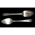 A pair of George III Scottish silver table spoons, with rubbed initials to finials, possibly 'RHG', ... 