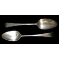 Two George III silver table spoons, both old English pattern and with engraved initials 'RMH' to the... 