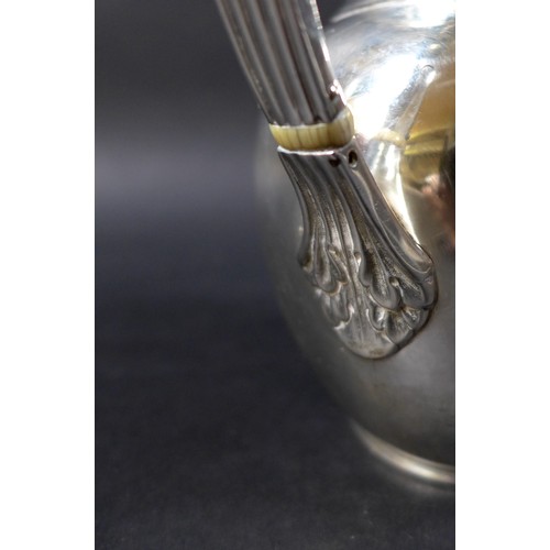 25 - A Victorian silver water jug, of ovoid form, with double hinged lid, reeded handle with acanthus lea... 