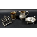 Four pieces of Victorian and later silver, comprising a Victorian silver Christening tankard, with f... 
