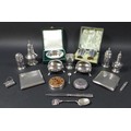 A collection of silver items, including a pair of Victorian cauldron salts, raised on three hoof fee... 