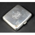 A late Victorian silver cigarette case, engraved to one side with an armorial crest 'Fac Et Spera' a... 