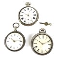 A group of three George III and Victorian silver pair cased pocket watches, all open faced, key wind... 