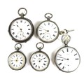 A group of five Victorian and Edwardian silver pocket watches, all open faced, key wind, three gentl... 
