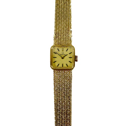 78 - A vintage Omega 9ct gold lady's wristwatch, model 1061, circa 1973, the square matte gold dial with ... 