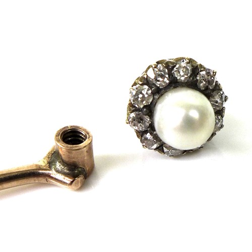 127 - A yellow metal stick pin, the removable head set with a cultured pearl surrounded by ten diamonds, 6... 