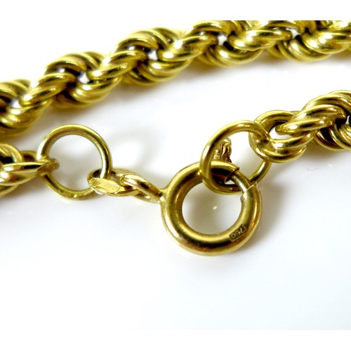 189 - An 18ct gold twisted rope link necklace, 0.5 by 95.5cm total chain length, marked 750, 27.0g.