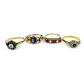 An 18ct gold, platinum, sapphire and diamond cluster ring, the royal blue sapphire surrounded by sma... 