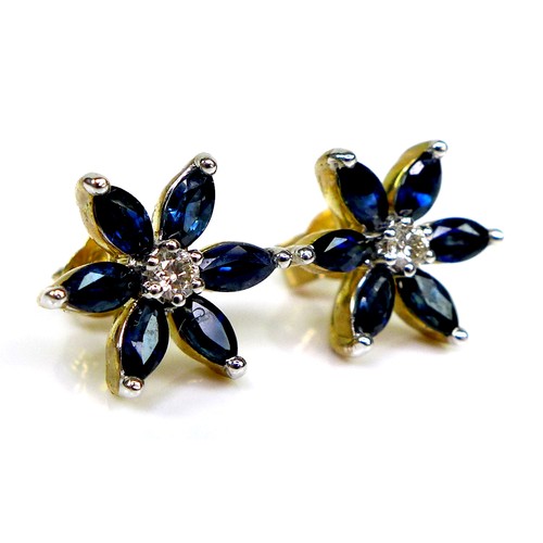 130 - A pair of 9ct gold, sapphire and diamond flowerhead stud earrings, six petalled design formed of mar... 