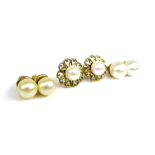 113 - Two pairs of gold and cultured pearl stud earrings, the first in 15ct gold with openwork heart desig... 