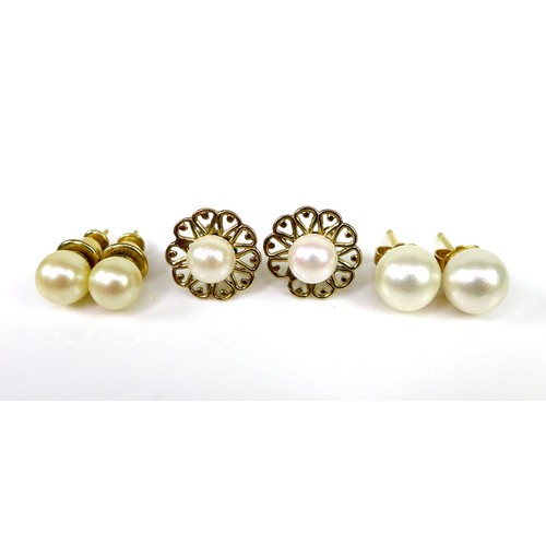 113 - Two pairs of gold and cultured pearl stud earrings, the first in 15ct gold with openwork heart desig... 