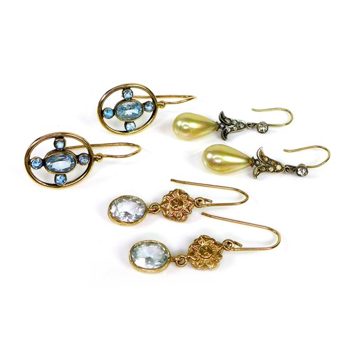 115 - A group of drop earrings, comprising a pair set in 9ct gold with blue topaz in a cross design, 3cm l... 