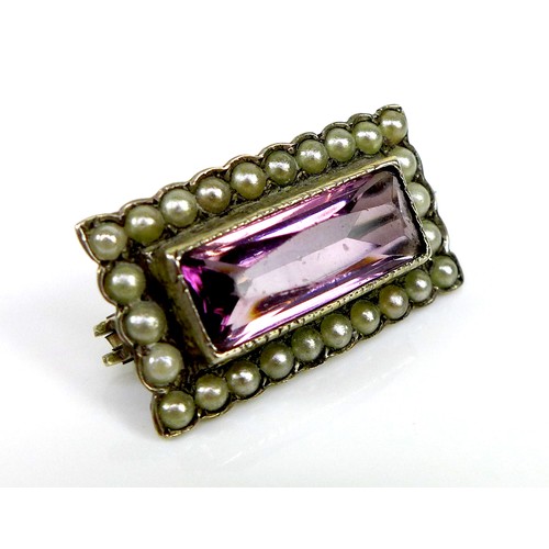 116 - Two 19th century silver brooches, the first of rectangular form with central amethyst surrounded by ... 