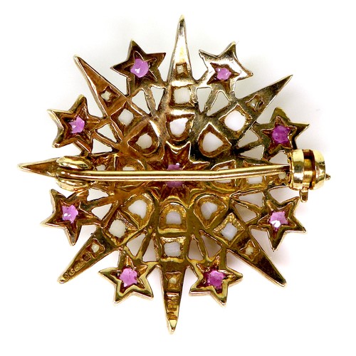 112 - A 9ct gold, ruby and pearl starburst brooch, 3.1cm diameter, 5.4g.