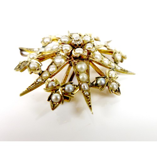 92 - A 9ct gold, pearl and diamond starburst brooch, a/f one pearl missing, 3.4cm diameter, 5.3g.