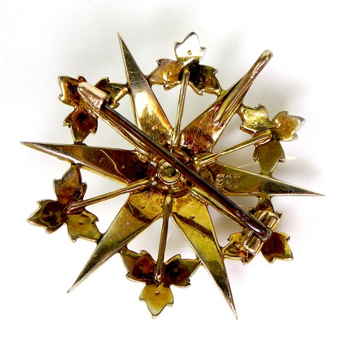 92 - A 9ct gold, pearl and diamond starburst brooch, a/f one pearl missing, 3.4cm diameter, 5.3g.