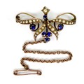 A 9ct rose gold, sapphire and seed pearl brooch, 3.7cm, with safety chain, 4.2g.