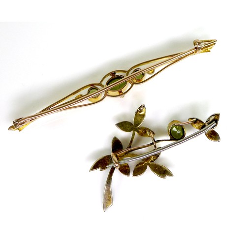 103 - Two 9ct gold brooches set with peridot and pearls, largest 6.2cm, 6.7g combined. (2)