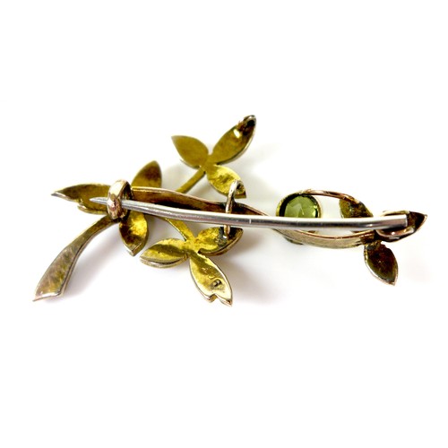 103 - Two 9ct gold brooches set with peridot and pearls, largest 6.2cm, 6.7g combined. (2)