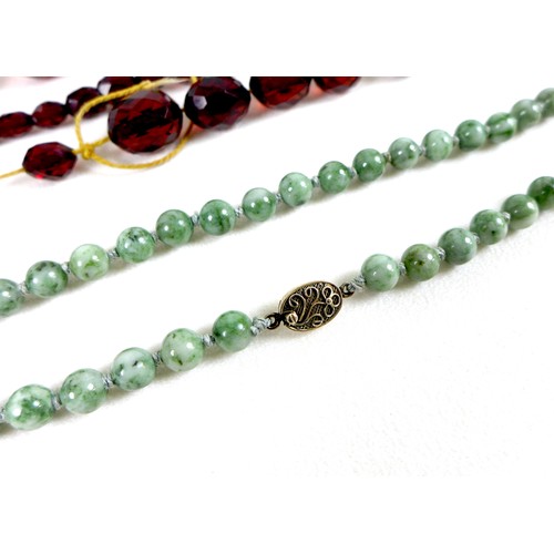 102 - Two vintage necklaces, comprising a jade bead necklace, of eighty eight beads, each 8.2mm diameter, ... 