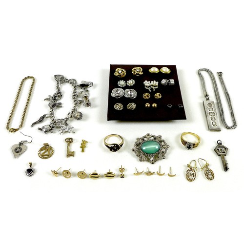 98 - A group of gold, silver and yellow/white metal jewellery, including a curb chain necklace with a sil... 