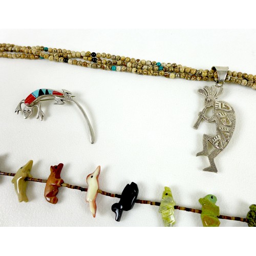 97 - A group of Navajo silver and hardstone jewellery, comprising three necklaces set formed of carved st... 