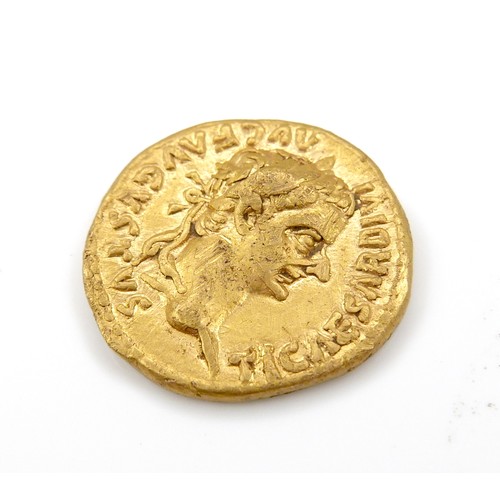 34 - An ancient Roman hammered gold aureus coin, Tiberius (AD 14-37), mint of Lugdunum, the obverse inscr... 