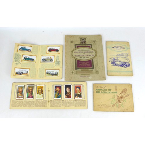 109 - A collection of mixed ephemera, including a number of John Player & Sons cigarette card albums, an o... 