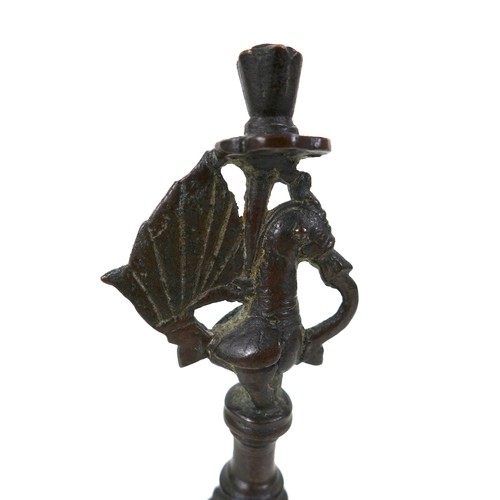 102 - An 18th century Deccan bronze oil lamp, Indian, with Hamsa bird detail to the top, turned body with ... 