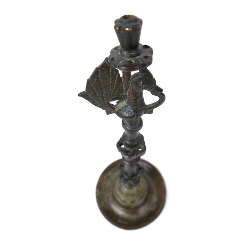 102 - An 18th century Deccan bronze oil lamp, Indian, with Hamsa bird detail to the top, turned body with ... 