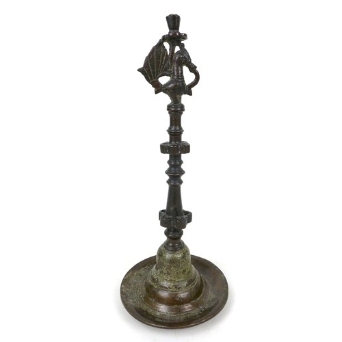 102 - An 18th century Deccan bronze oil lamp, Indian, with Hamsa bird detail to the top, turned body with ... 