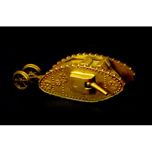 116 - A WWI trench art brass Mk 1 tank, with two side guns, and rear steering wheels, 13 by 4.8 by 4.2cm h... 