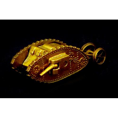 116 - A WWI trench art brass Mk 1 tank, with two side guns, and rear steering wheels, 13 by 4.8 by 4.2cm h... 