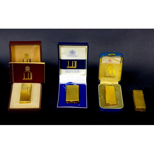 111 - Four retro gold plated Dunhill cigarette lighters, comprising a Dunhill 70 lighter, with original ca... 