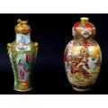 Two Oriental vases, comprising a small Cantonese porcelain lidded vase, 10 by 24.5cm high, and a 20t... 