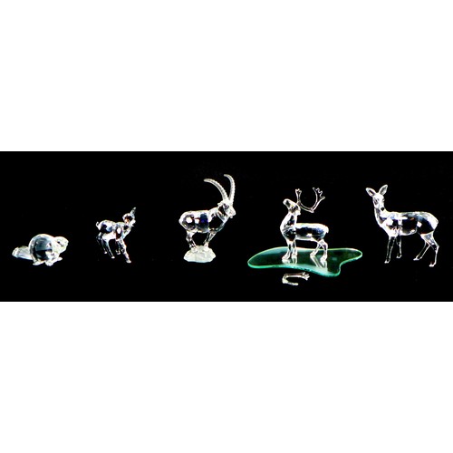 90 - Five Swarovski crystal ornaments, comprising an Ibex A7684 NR 000 001, 10cm high, a beaver A7616 NR ... 