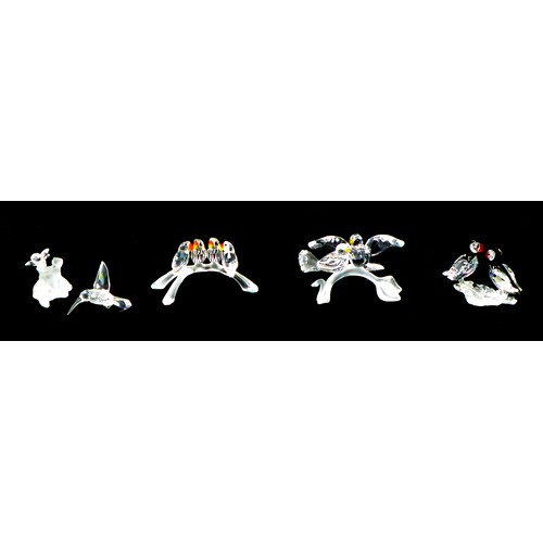 78 - Four Swarovski crystal ornaments, comprising a figural group of two turtle doves A7621 NR 000 011, 6... 