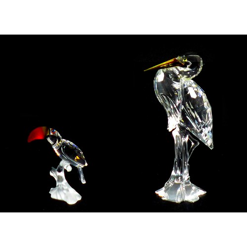 74 - Two Swarovski crystal ornaments, comprising a Heron A7670 NR 000 001, 15cm high, with presentation c... 