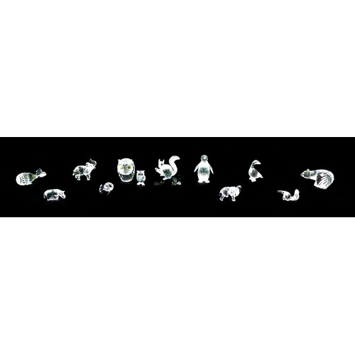 82 - Twelve Swarovski crystal ornaments, comprising a 10th anniversary edition 'The Squirrel', 6cm high, ... 