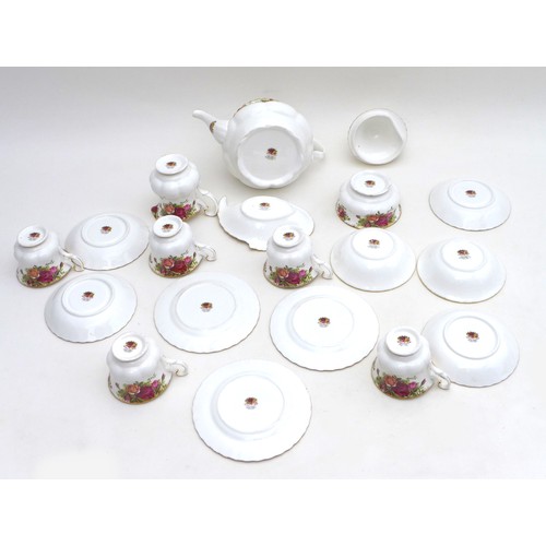 25 - A Royal Albert part dinner service, decorated in the 'Old Country Roses' pattern, comprising teapot,... 