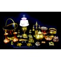 A group of copper and brass items, including a Victorian jelly mould, stamped '375', coal scuttle, k... 