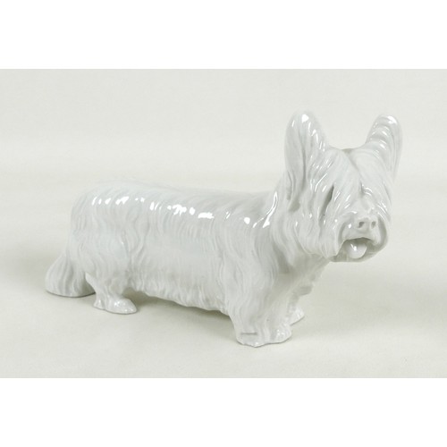 63 - A Meissen blanc de chine porcelain figurine, modelled as a 'Skye Terrier', circa 1940, model number ... 